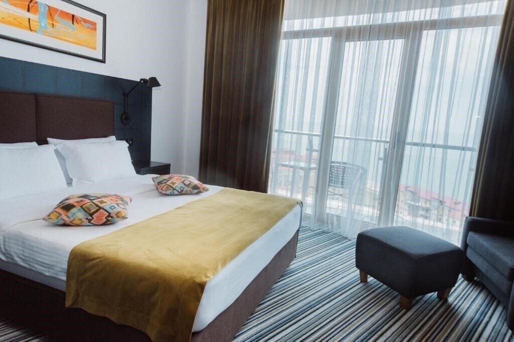 Апартаменты Tangerine Apart Hotel 4*