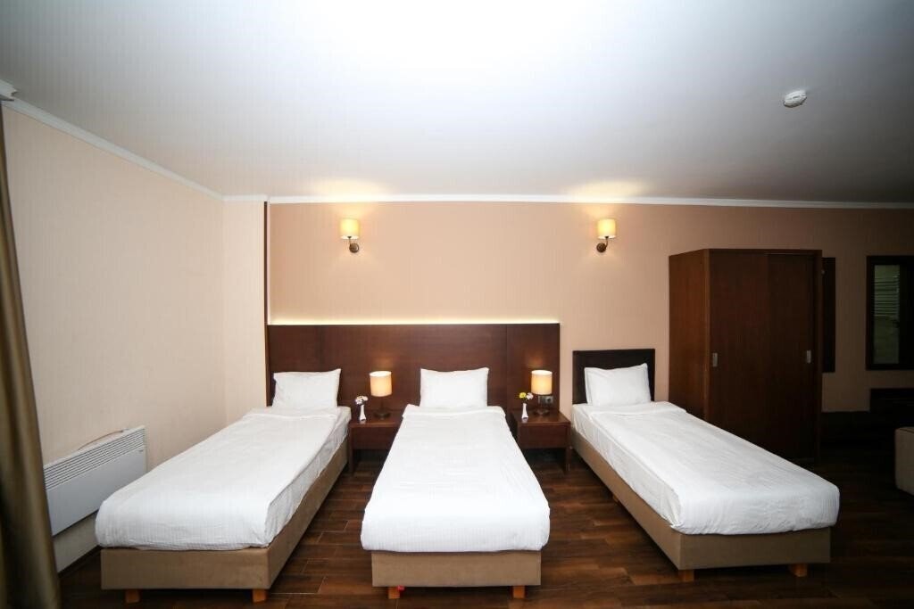 Апартаменты Corner Inn Hotel 4*