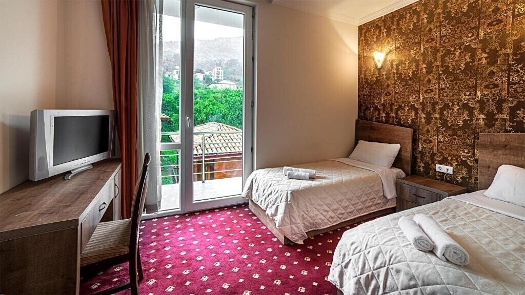 Фотографія Orange Hotel 3*