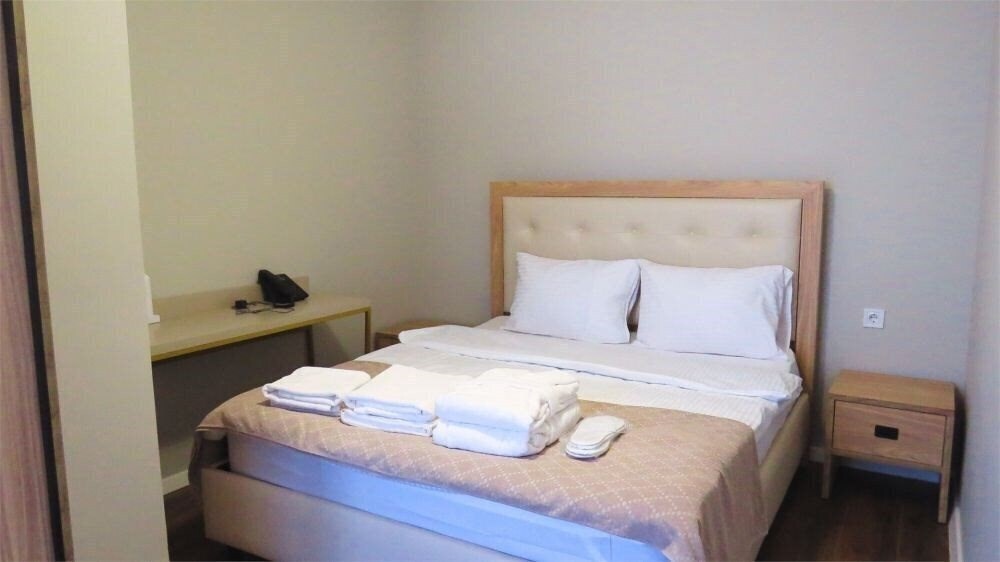 Отель Komunna Luxe Hotel & Apartments 4*