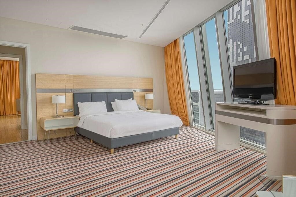 Апартаменти Radisson Blu Hotel 5*