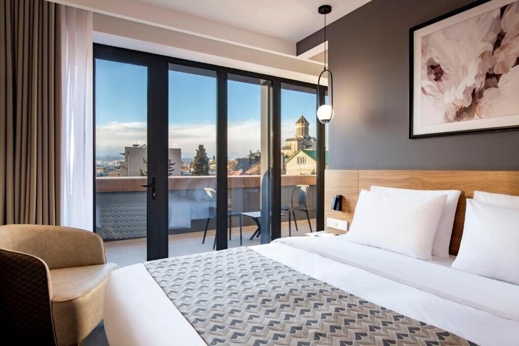 Готель Clocks 4*