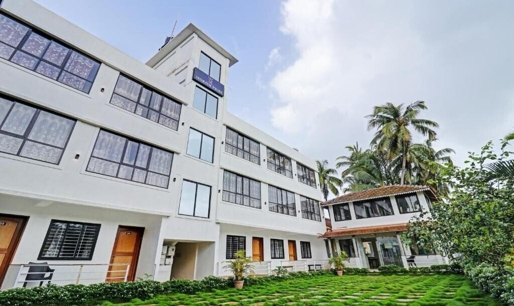 Фотографія Treebo Morjim Pride 3*