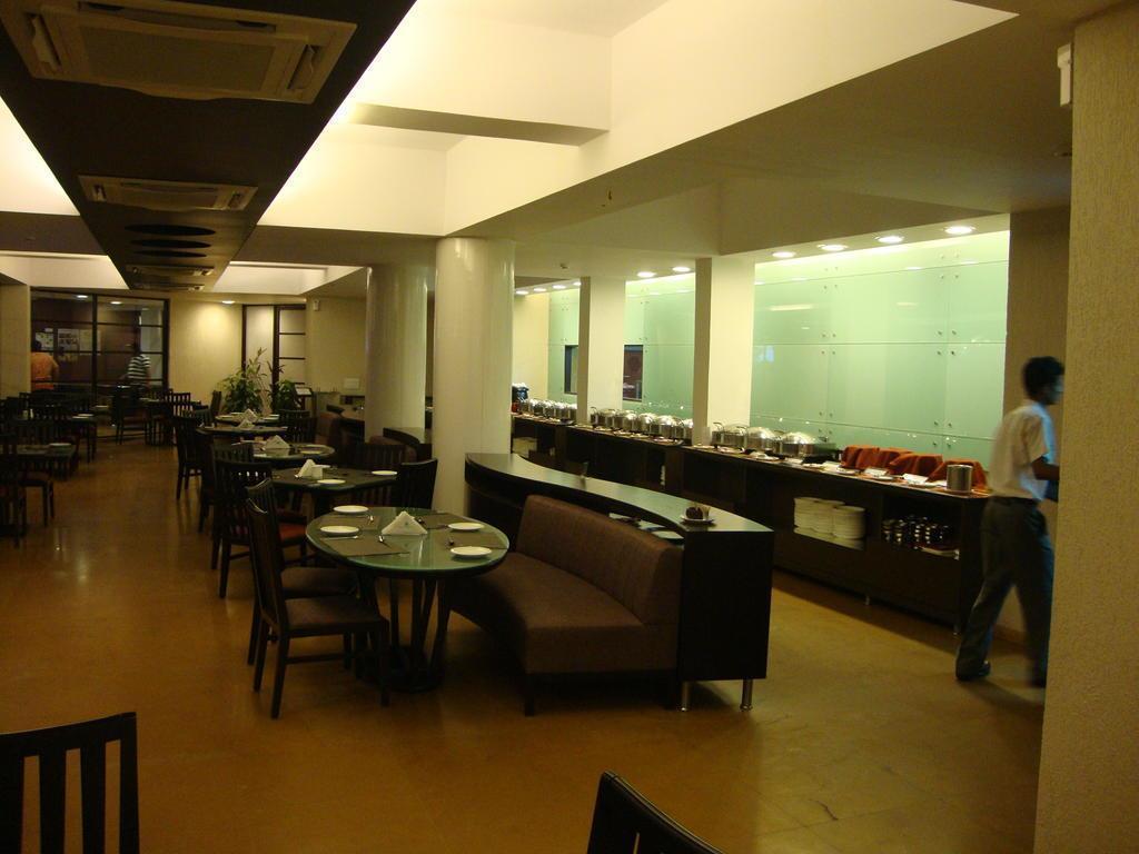 Фотография Whispering Palms 4*