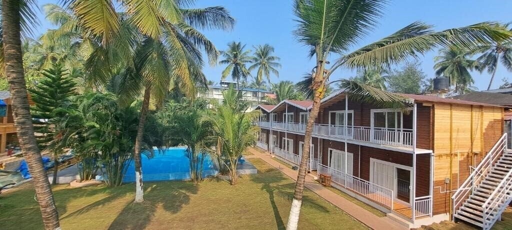 Отель Shaans Coco Palms Beach Resort (ex. Morjim Coco Palms) 2*