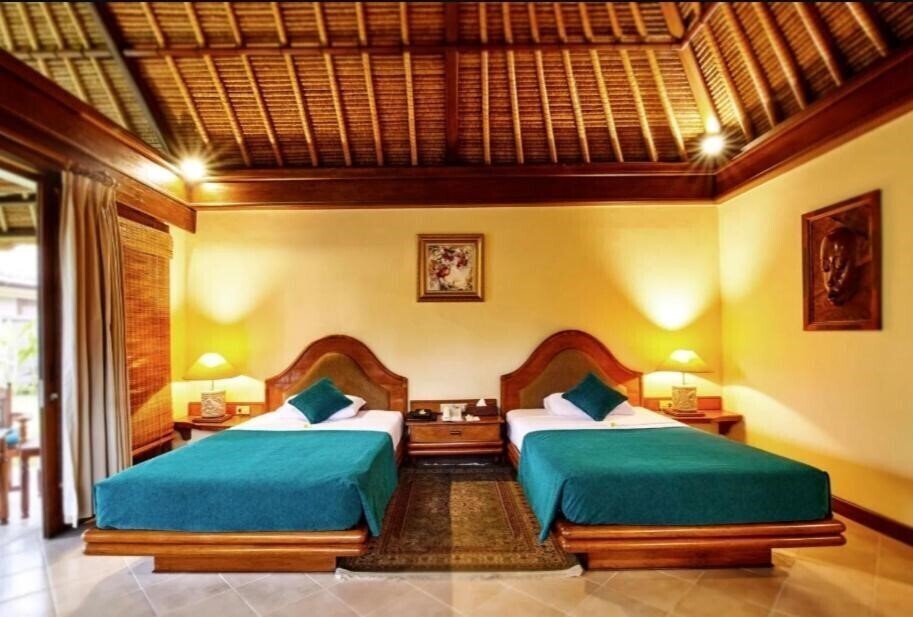 Апартаменты Puri Bagus Lovina 4*