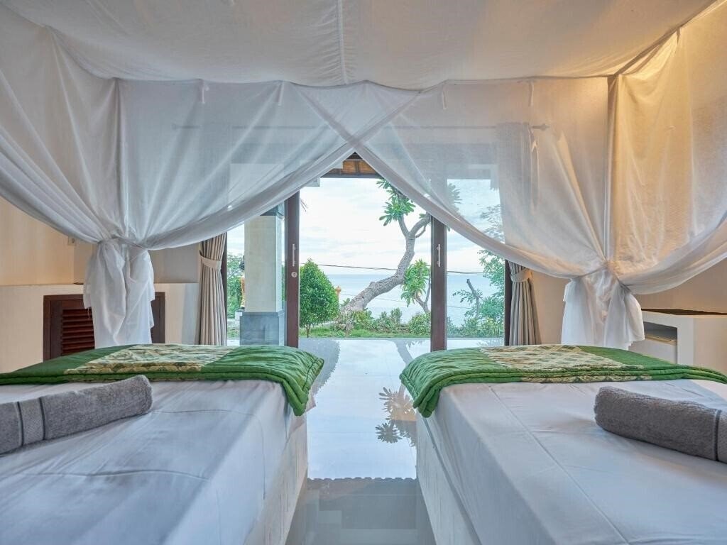 Фото Anda Amed Resort вилла