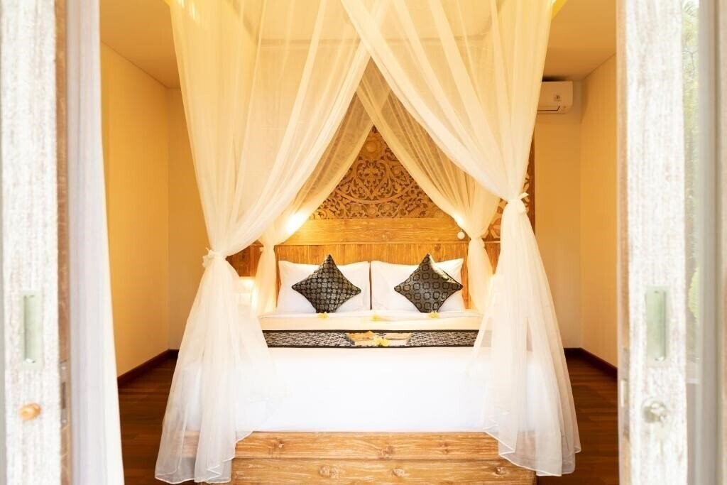 Территория Ubud Inn Cottage 3*