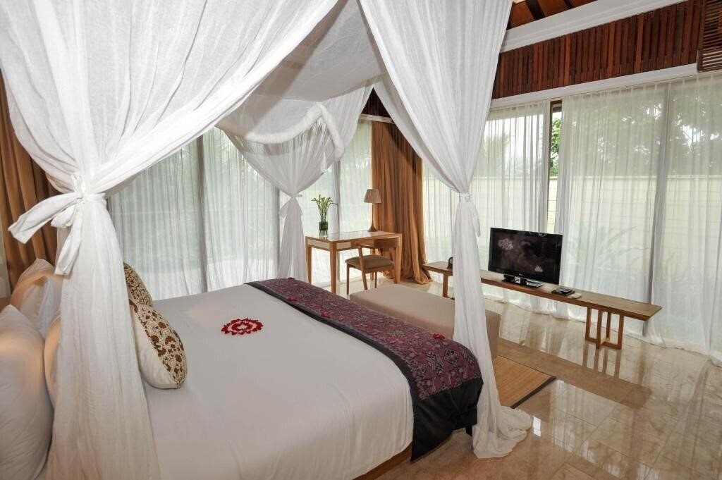 Вид Komaneka at Rasa Sayang 4*