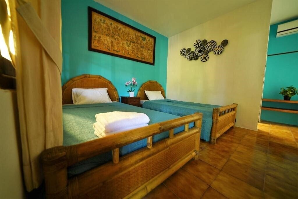 Фото Mangga Bungalow Guest House 3*