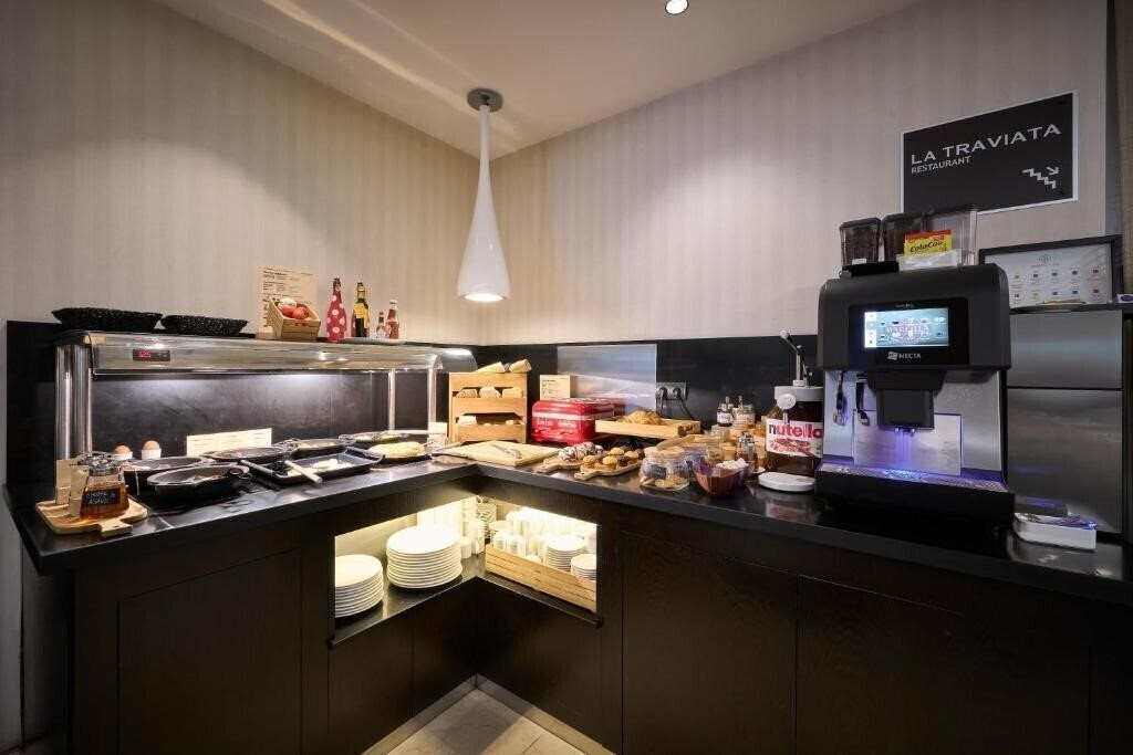 Вид Catalonia Rigoletto Hotel 4*