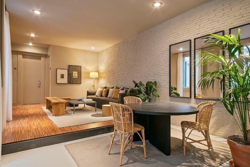 Апартаменты Uma Suites Pau Claris 3*