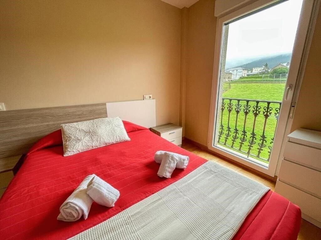 Фото Apartamentos Playa De Las Catedrales 3000 3*