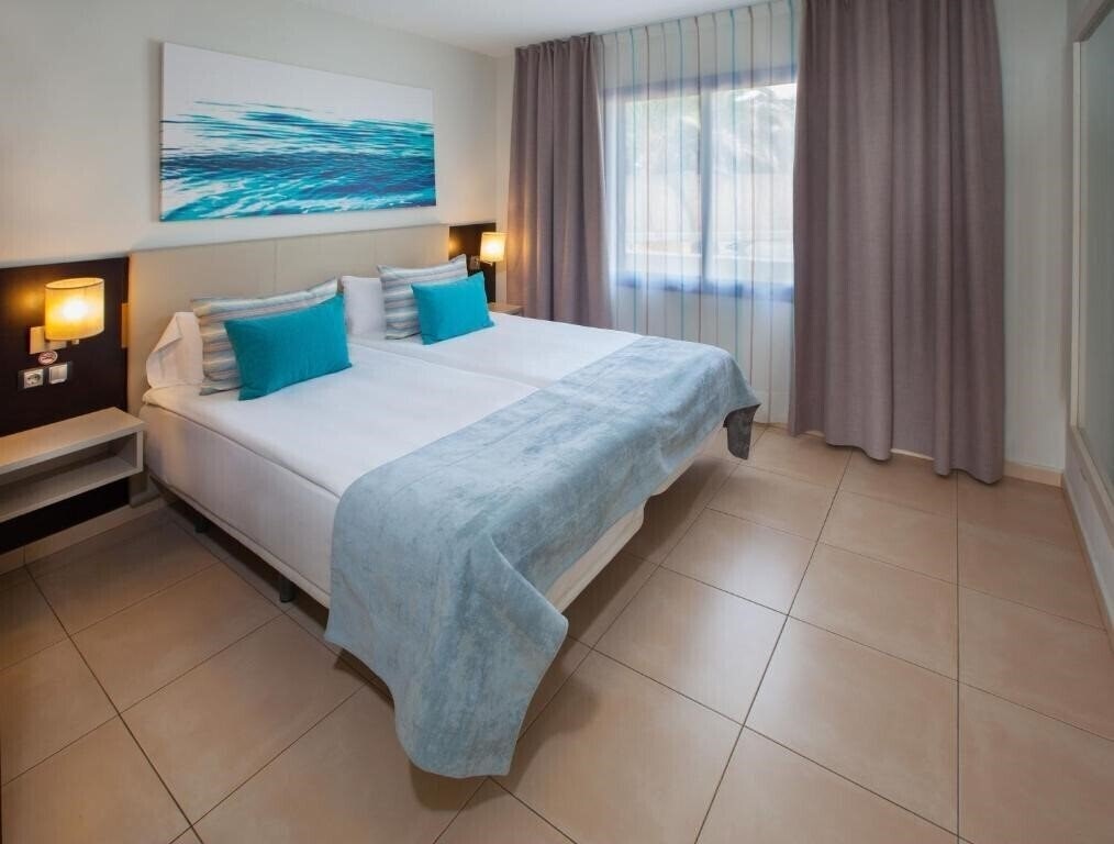 Фото Grupotel Playa Feliz 2*