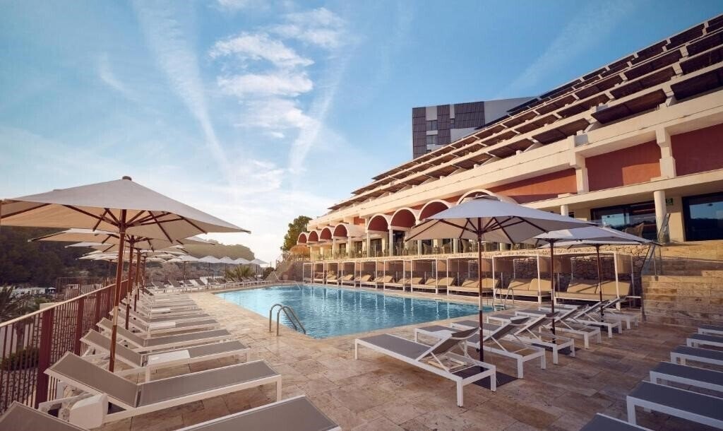 Вид The Club Cala San Miguel Hotel Ibiza, Curio Collection by Hilton 5*