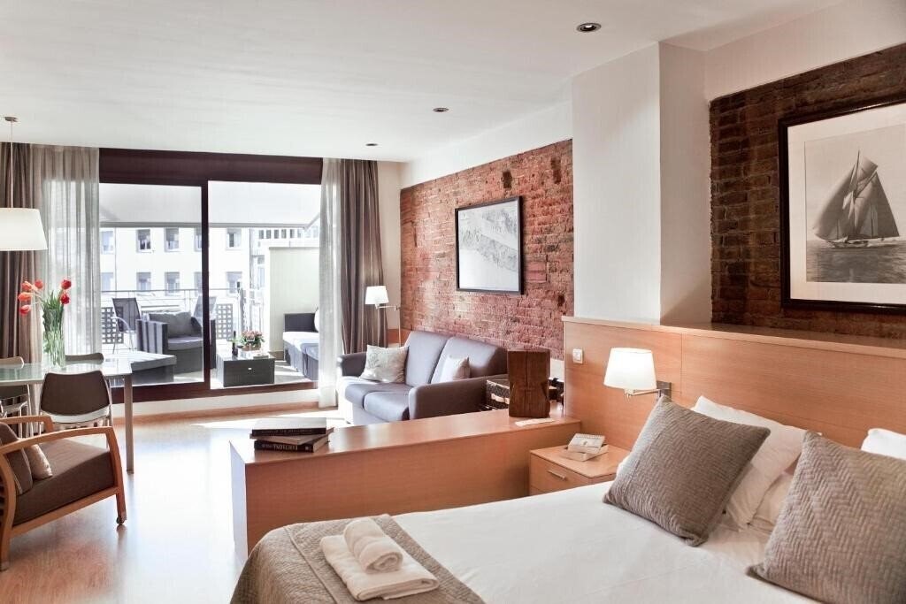 Отель Barcelona Apartment Wello 4*
