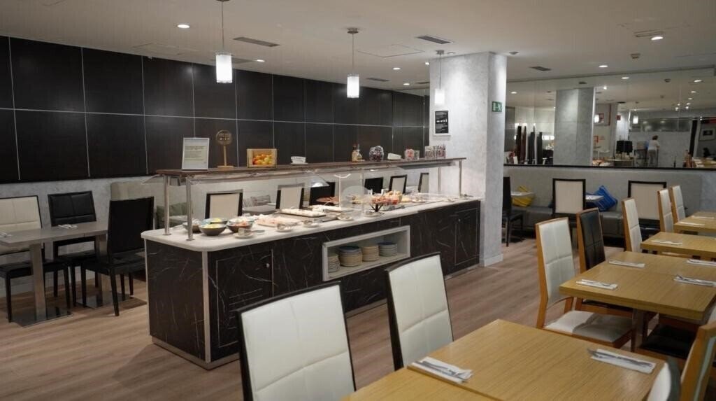 Изображение Petit Palace Cliper Gran Via 3*