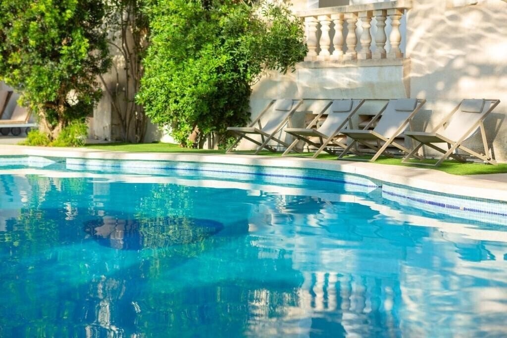 Апартаменти Es Baulo Petit Hotel 4*