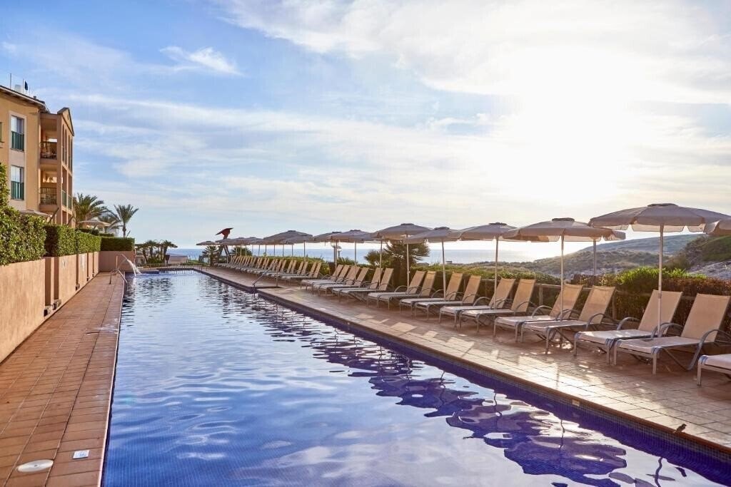 Апартаменты Zafiro Cala Mesquida 4*