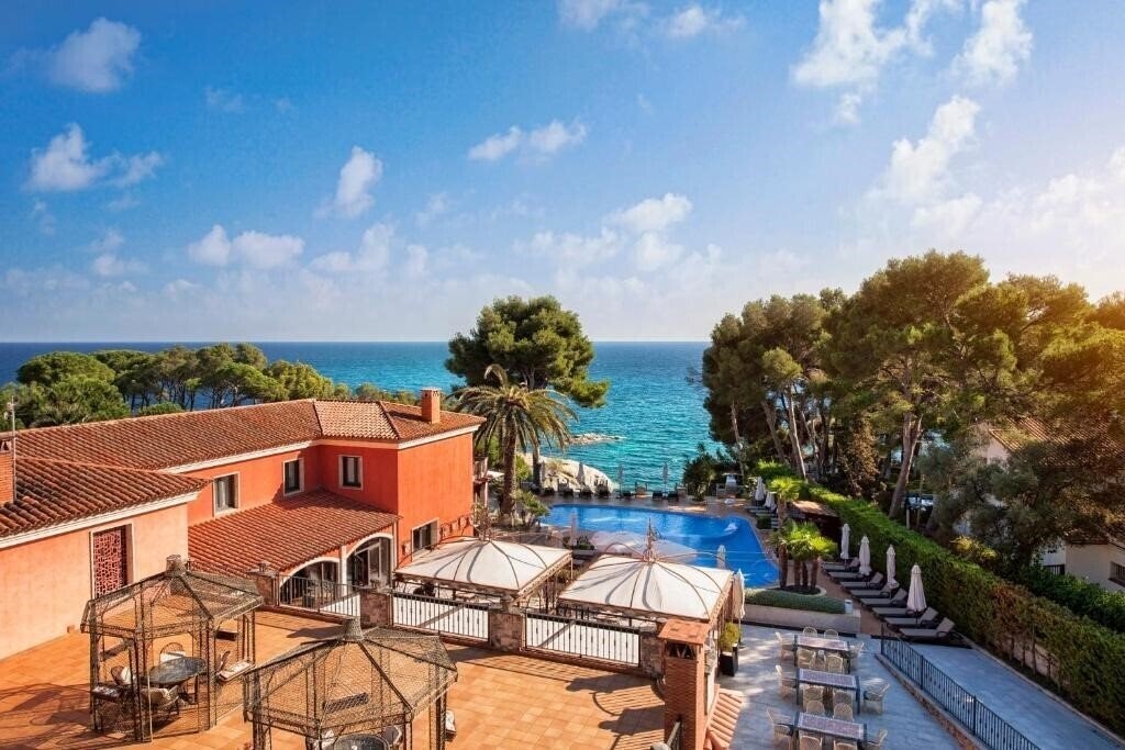 Фотографія Salles Hotel & SPA Cala del Pi 5*
