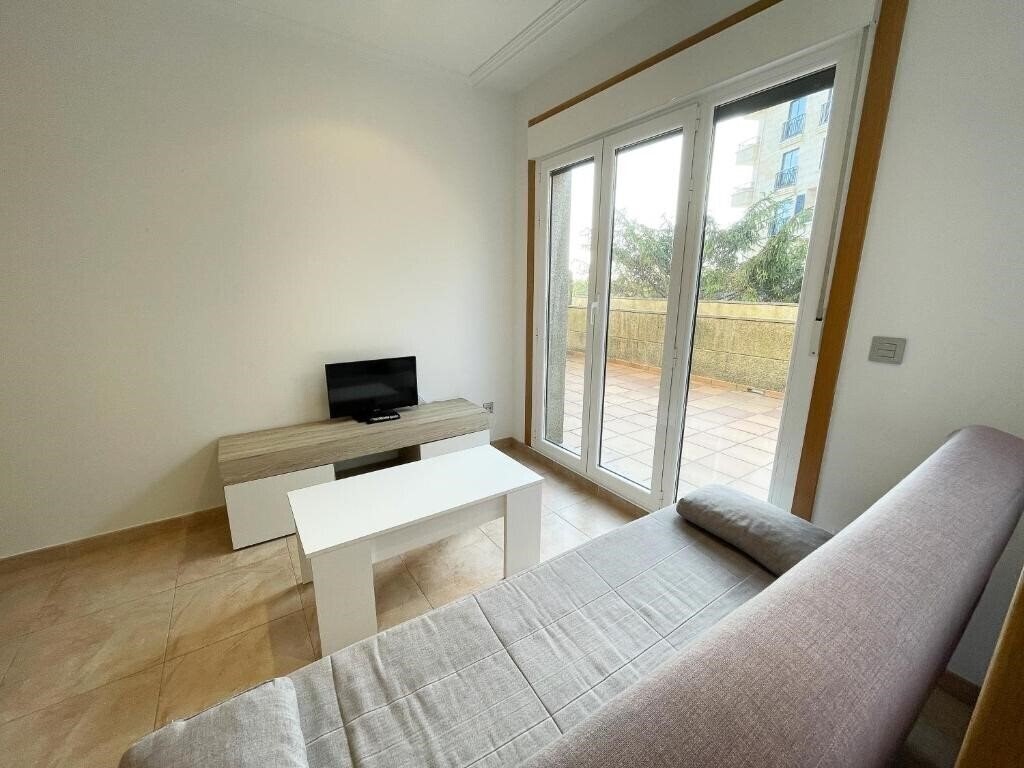 Вид Apartamentos Revolta Sanxenxo 3000 3*