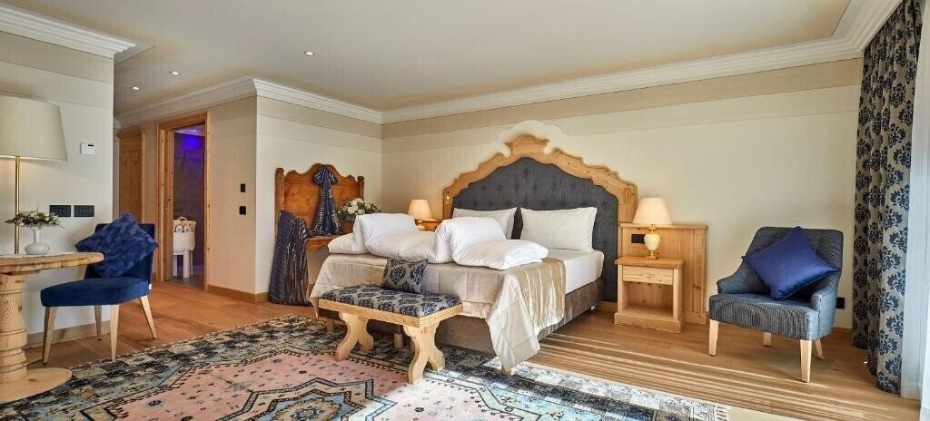 Апартаменты Sassongher 5*