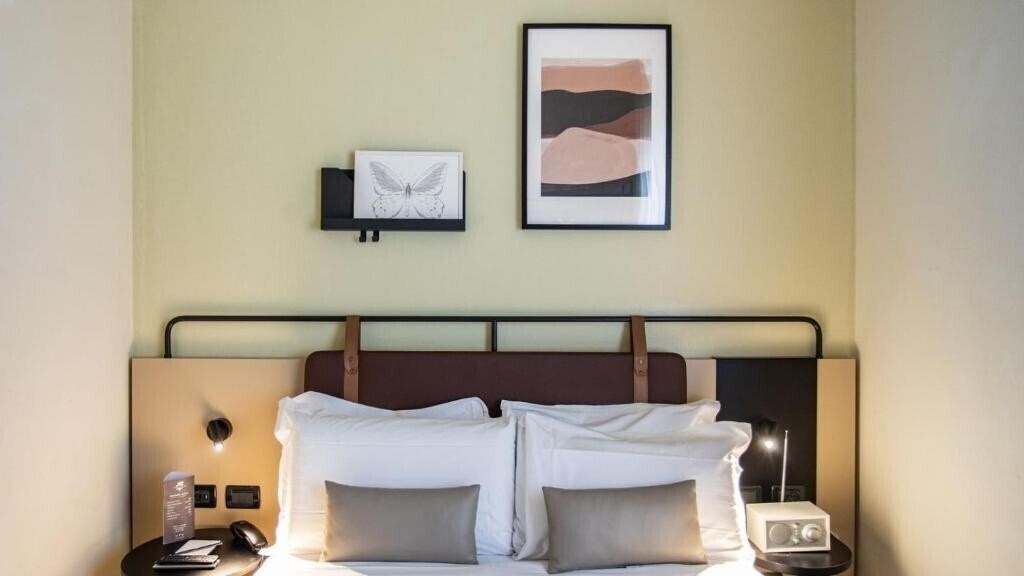 Фотографія I Portici Hotel Bologna 4*