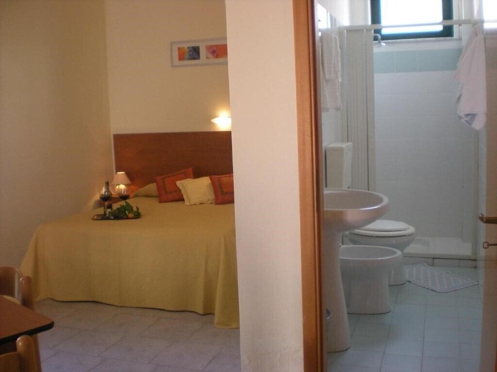 Фотографія Villaggio Artemide 4*