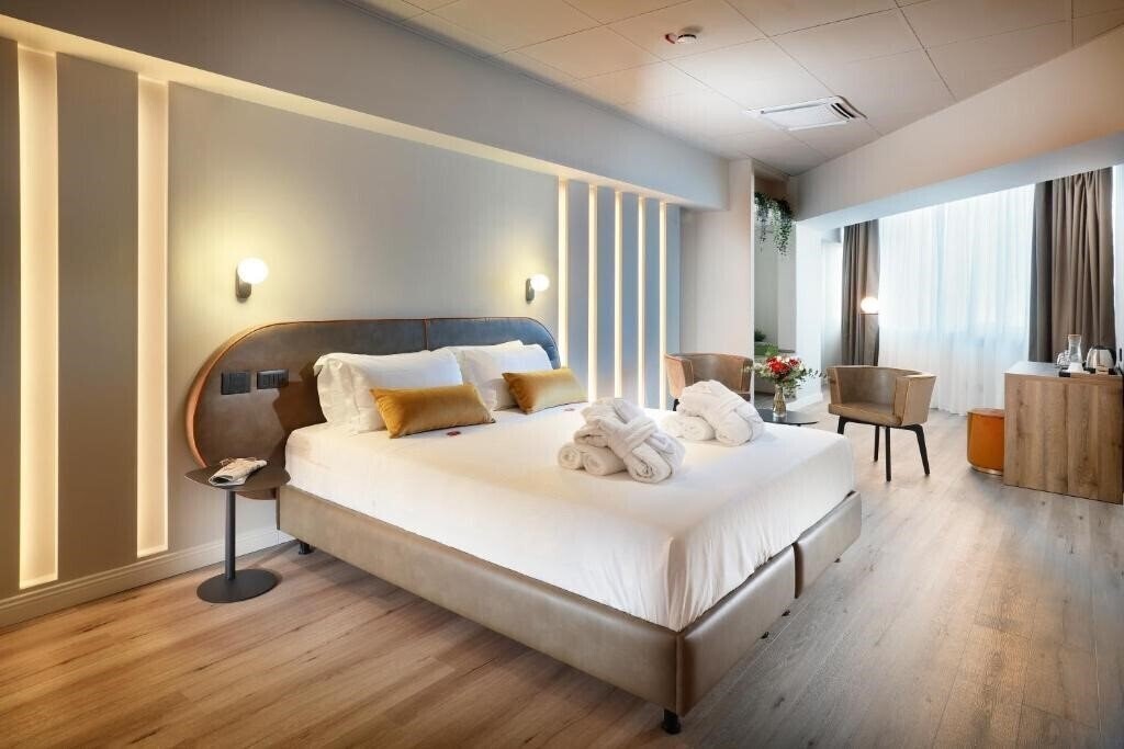 Фотографія Tuscany Inn 4*