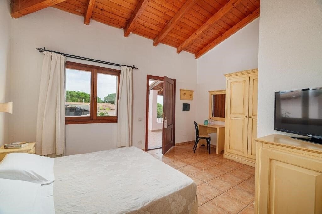 Фото Club Esse Cala Gonone 4*