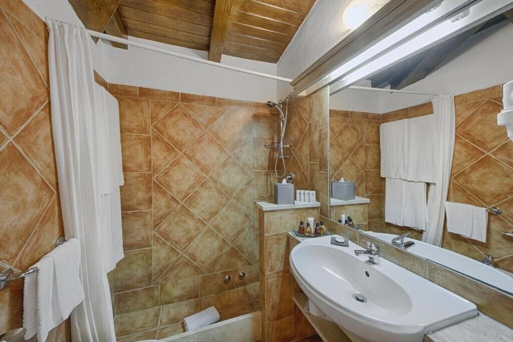 Апартаменты Colonna Resort Country & Sporting Club 4*