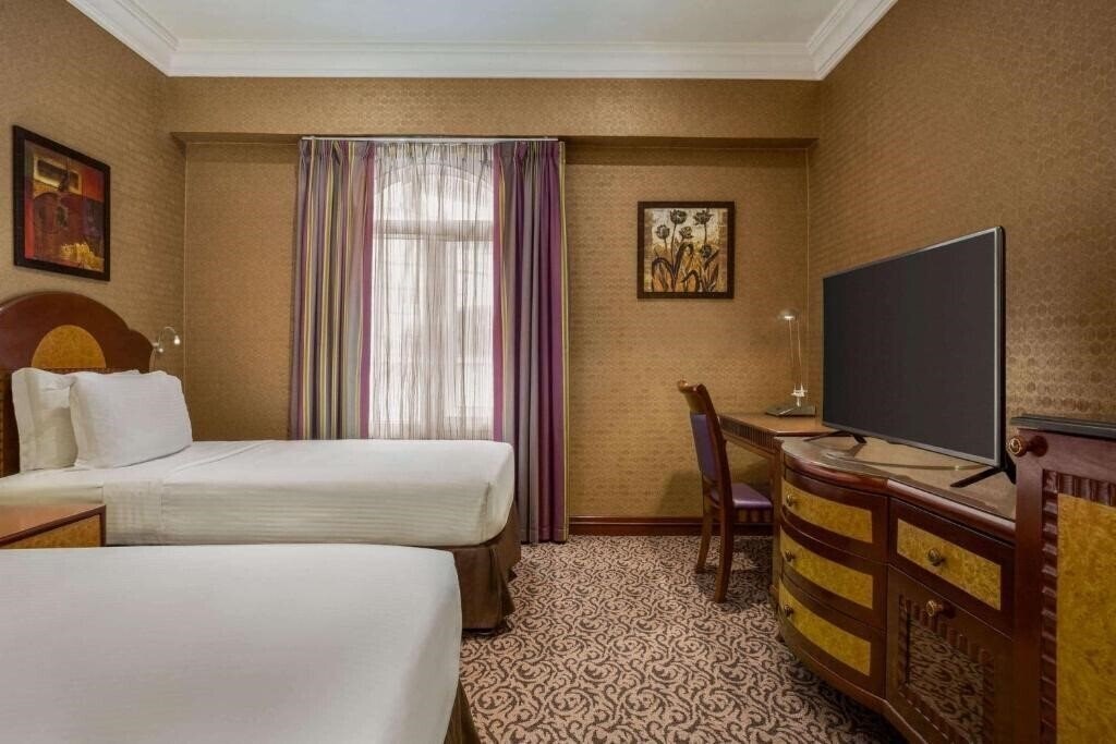 Апартаменты Wyndham Grand Regency Doha 5*