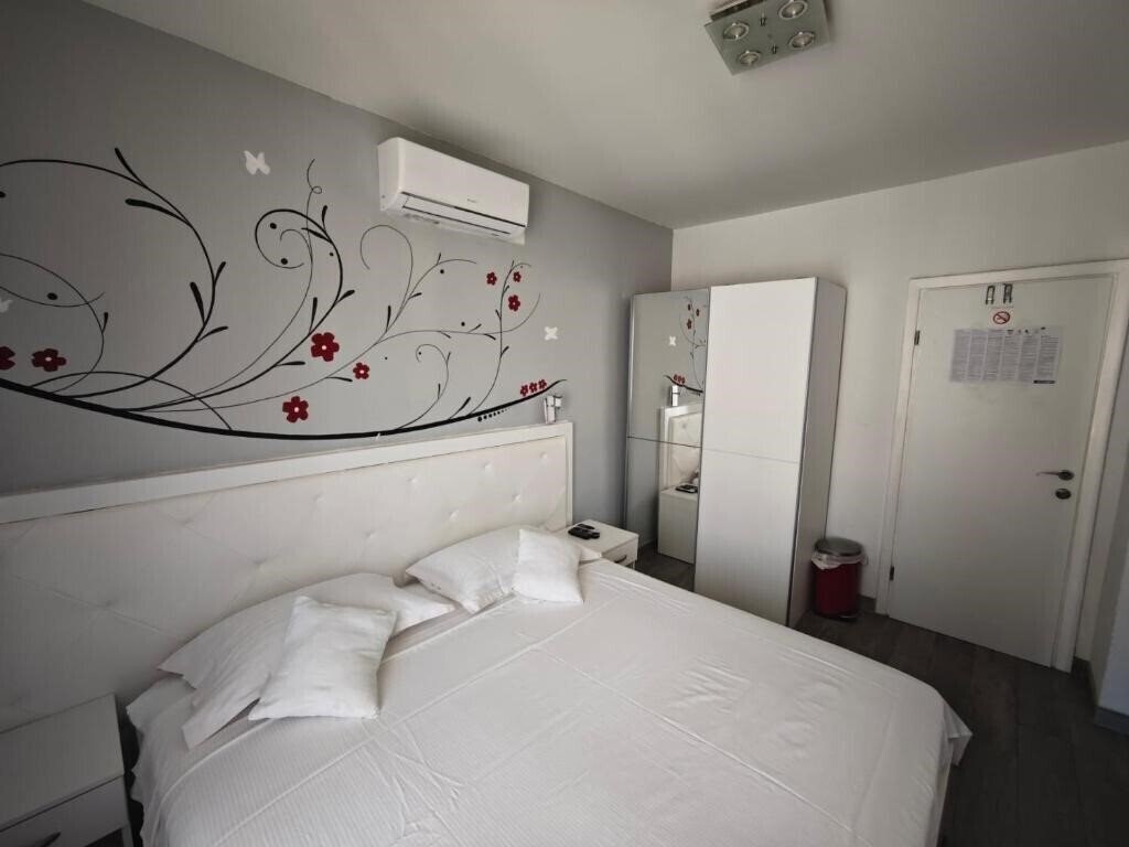 Фотография Nirvana Rooms & Apartments 3*