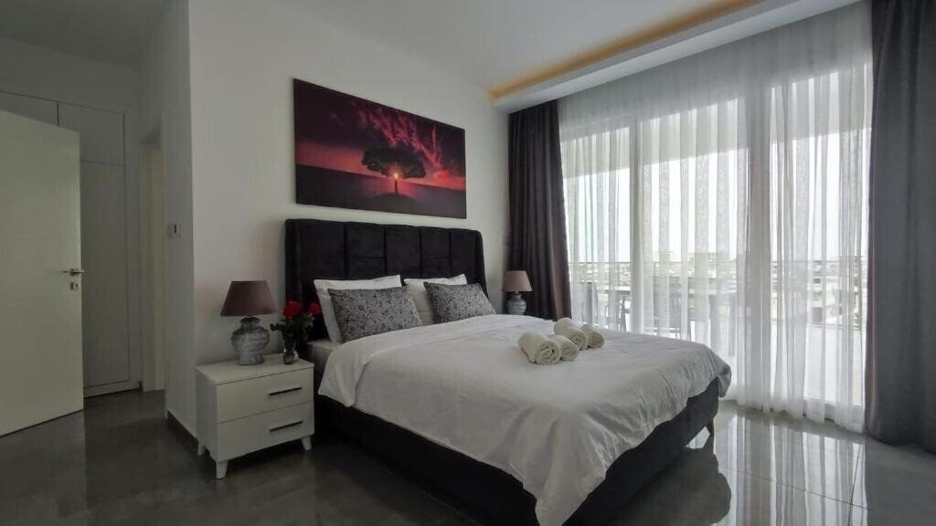 Апартаменты Courtyard Long Beach Holiday Resort 5*