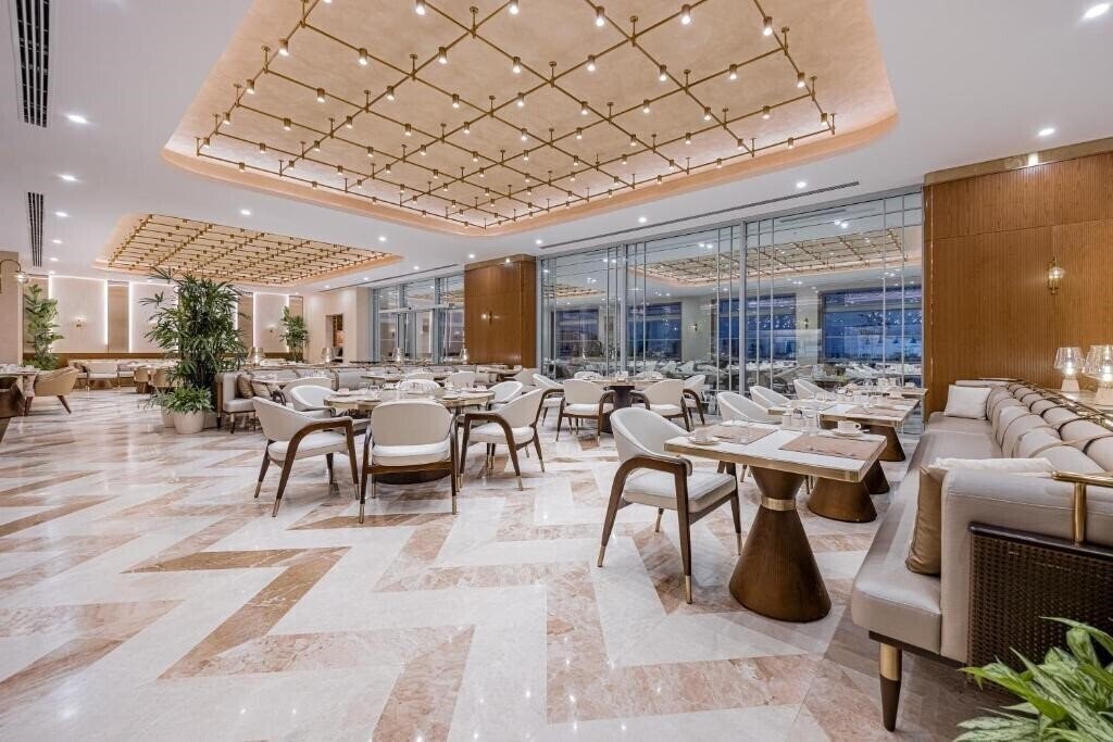 Апартаменты Merit Park Hotel 5*