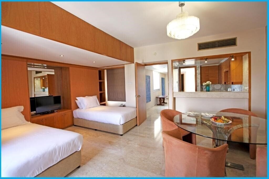 Вид Poseidonia Beach Hotel 4*