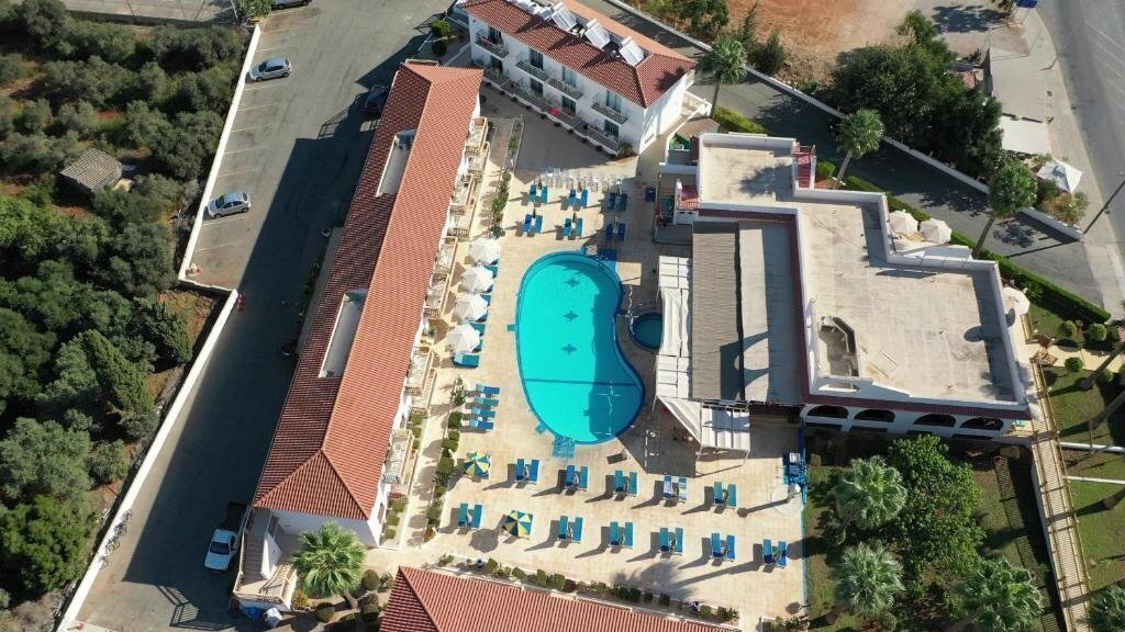 Отель Cosmelenia Hotel Apartments 3*