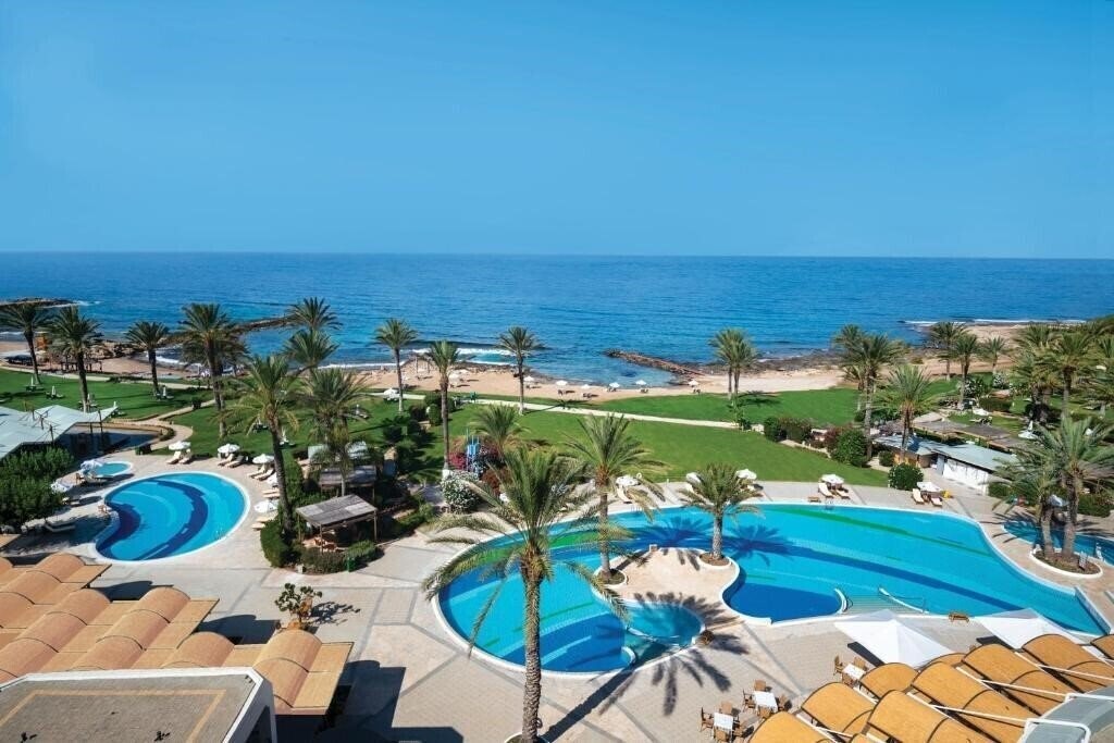 Панорама Constantinou Bros Athena Beach Hotel 4*