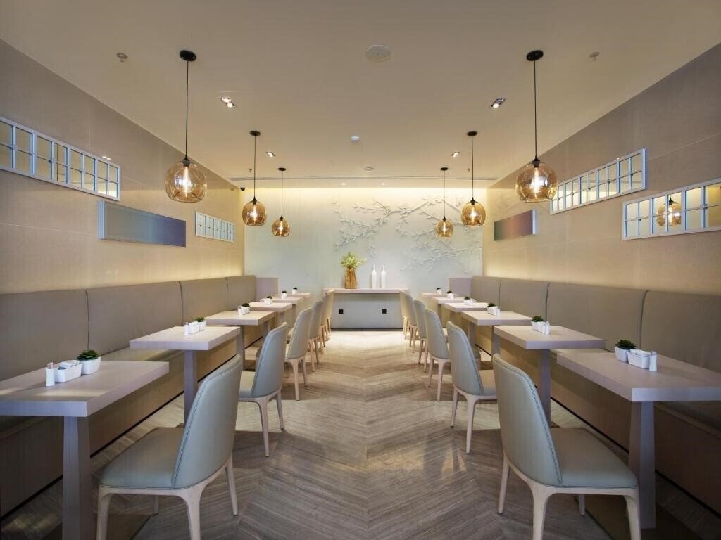 Апартаменты Mercure Hotel Dalian Friendship Square 4*