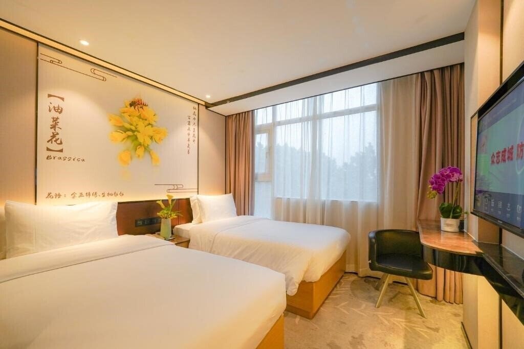 Фото Baiyun City Hotel 3*