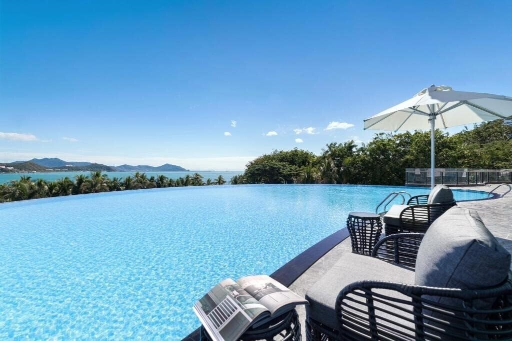 Апартаменты Sanya Junji Seaview Hotel 5*