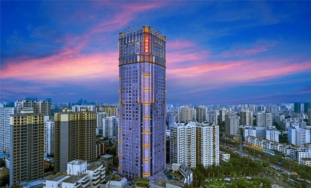Фото Haikou Mingguang Shengyi Hotel 5*
