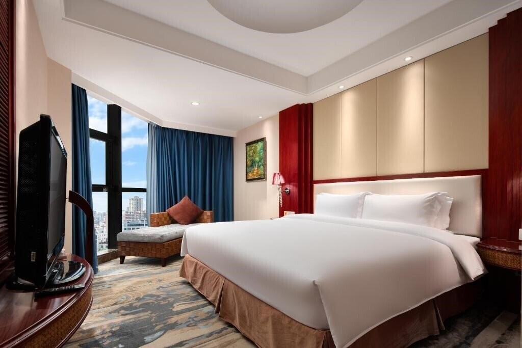 Фотографія Haikou Mingguang Shengyi Hotel 5*