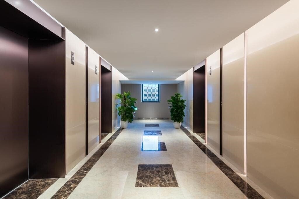 Апартаменти Sunworld Hotel Beijing 4*