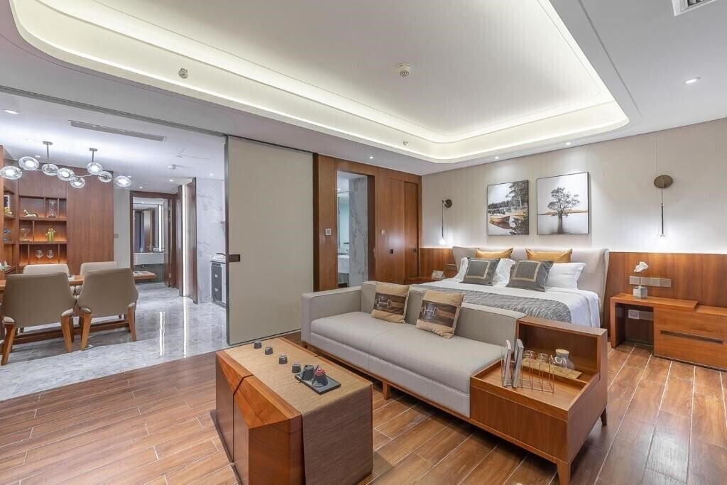 Апартаменты Tiancheng Central Coast Seaview Hotel 5*