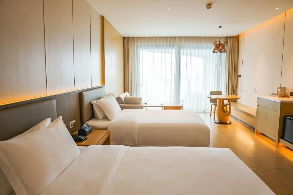 Панорама Tiancheng Central Coast Seaview Hotel 5*