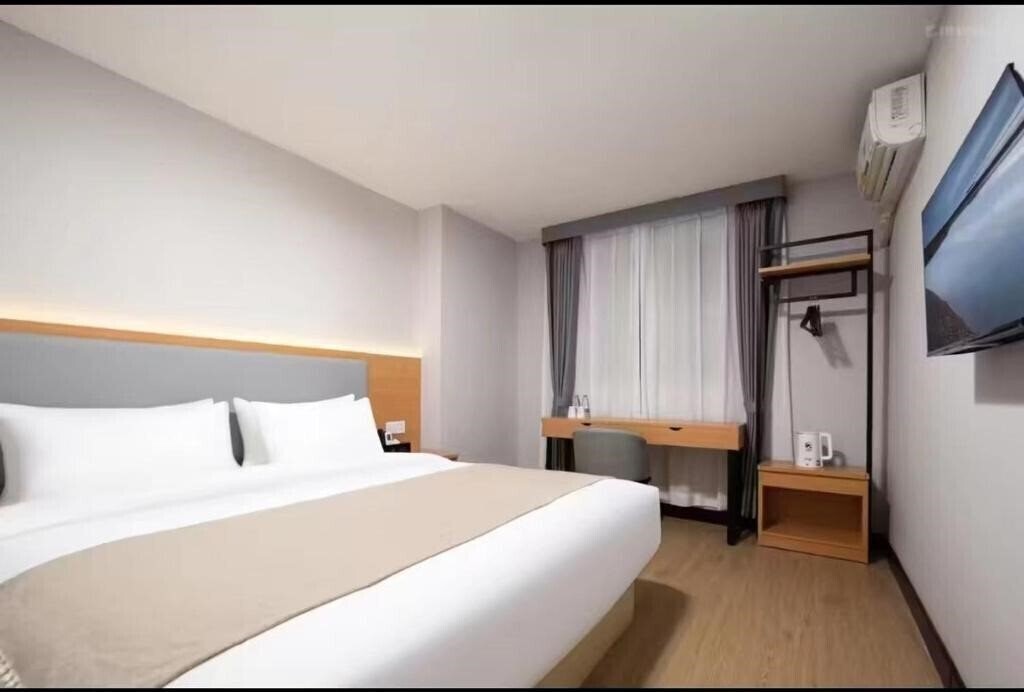 Апартаменты Guan Hai Lou Hotel 3*