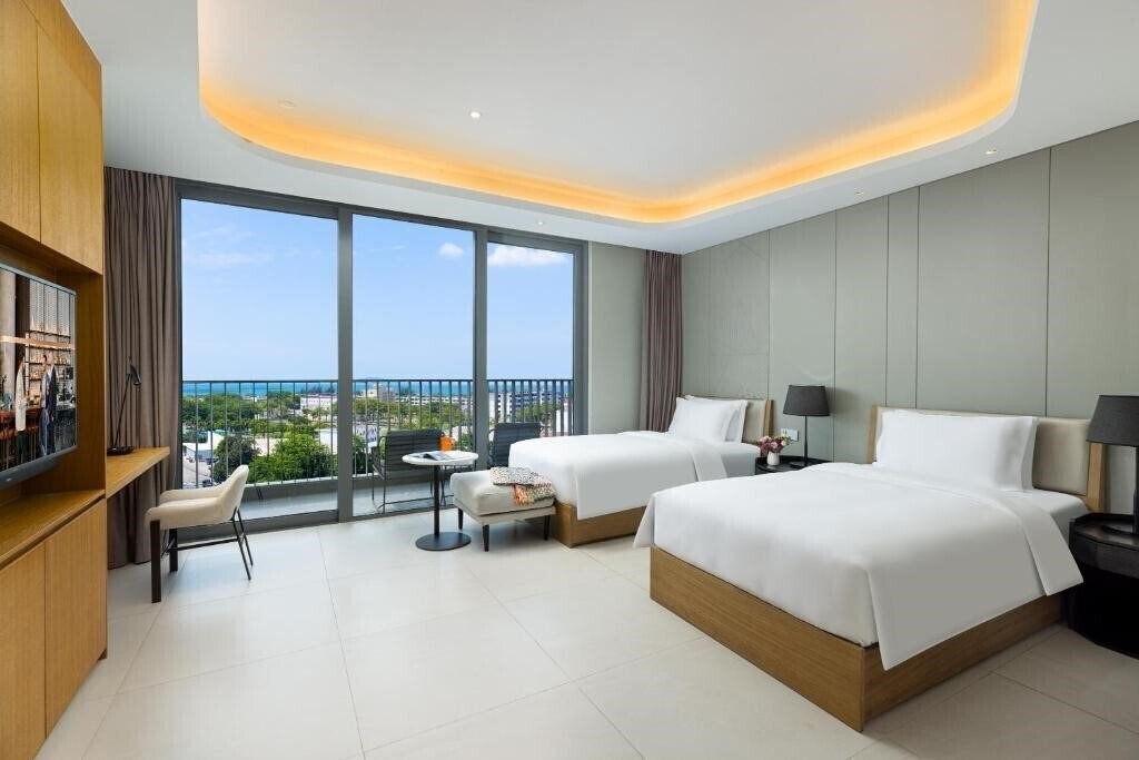 Отель Oakwood Apartments Sanya 4*