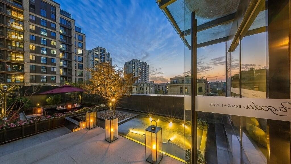 Апартаменты Pagoda Hotel Shanghai Wujiaochang 5*