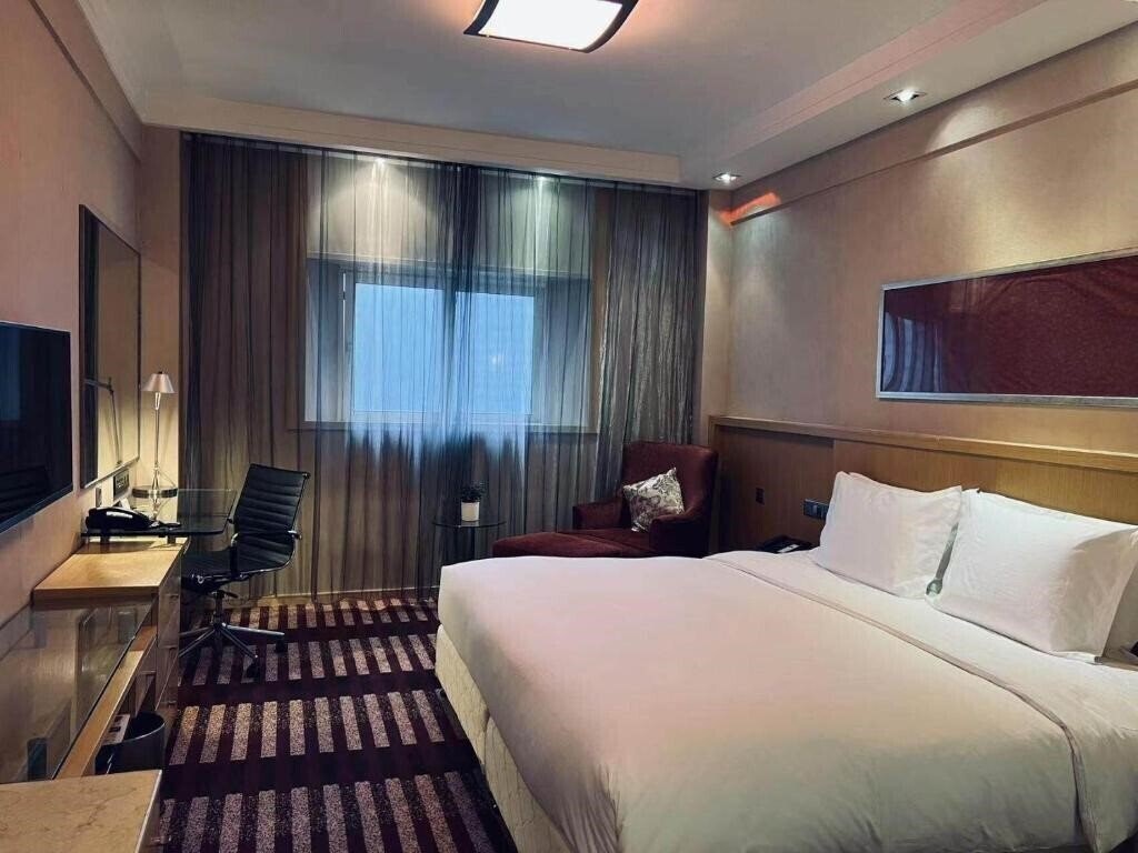 Апартаменты Park Inn by Radisson Shanghai Downtown 4*